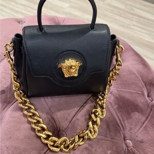 SOLD… Versace Black and Gold Women's Bag